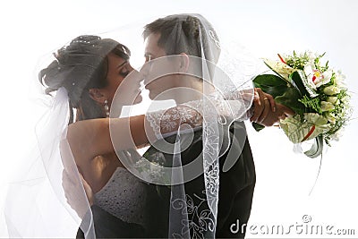 Kissing couple wedding portrait Stock Photo