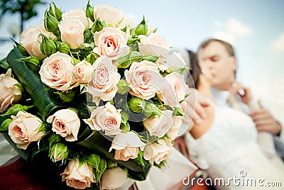 Kissing wedding couple Stock Photo