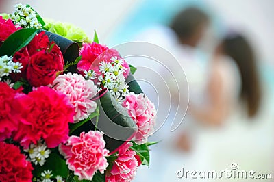 Kissing wedding couple Stock Photo