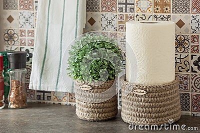 Kitchen accessories on the table, eco design, jute eco-friendly containers, order and cleanliness in the kitchen Stock Photo