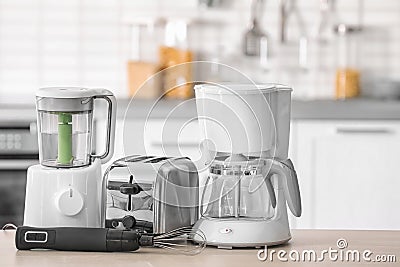 Kitchen appliances on table Stock Photo