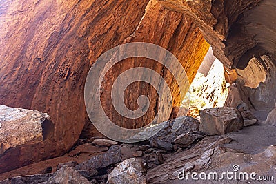 The Kitchen Cave at the base of Ayers Rock or Uluru is where the ancient Aborigine women used as cooking place. Editorial Stock Photo