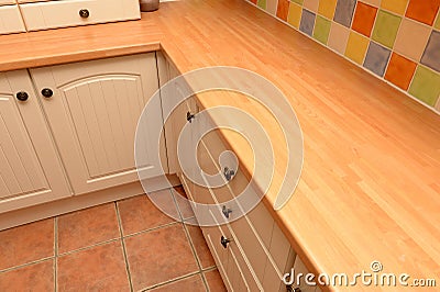 Kitchen cupboards and worktop Stock Photo