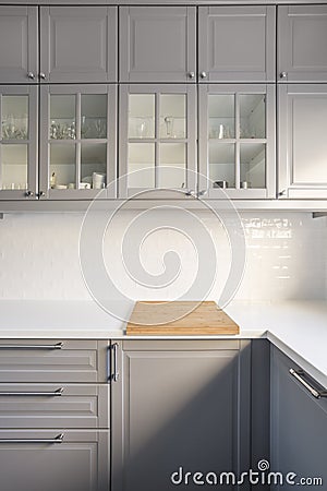 Kitchen with grey cupboards Stock Photo