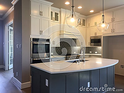 Kitchen with island counter design in a new house Stock Photo