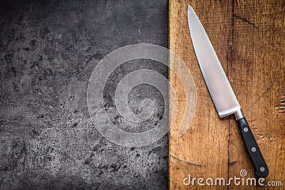 Kitchen knife on concrete or wooden board Stock Photo