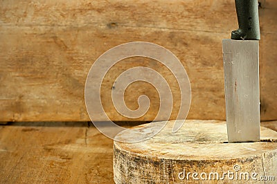 Kitchen knife and cutting board on a wooden table. Stock Photo