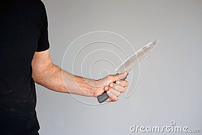 Kitchen knife in a hand Stock Photo