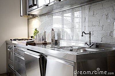 Modern Kitchen with Stainless Steel Appliances Stock Photo