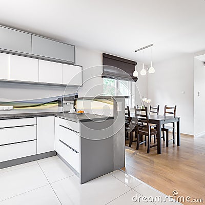 Kitchen open to dining room Stock Photo