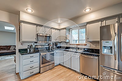 Kitchen real estate fridge wood floor pantry living mortgage Stock Photo