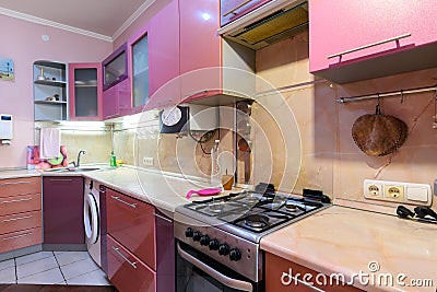 Kitchen set of a small kitchen in a furnished apartment for rent Stock Photo