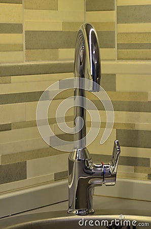 Kitchen Single hand Faucet with reflections Stock Photo