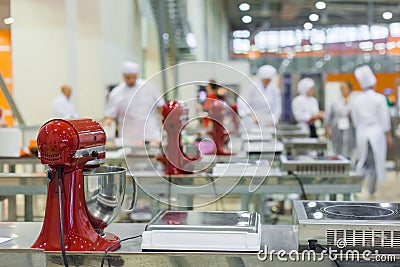 Kitchen stand food mixers on table at cuisine of restaurant Stock Photo