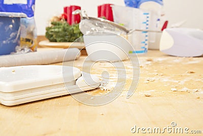 Kitchen table with baking utensils Stock Photo