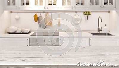 Kitchen table top and blur background of cooking zone interior Stock Photo