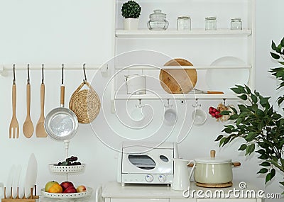Kitchen tools on wall Stock Photo