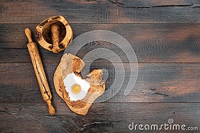 Kitchen utensils dough ingredients. Rolling pin wooden board Stock Photo