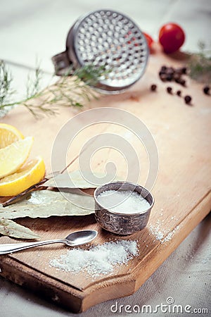 Kitchen utensils, spices and herbs for cooking fish Stock Photo