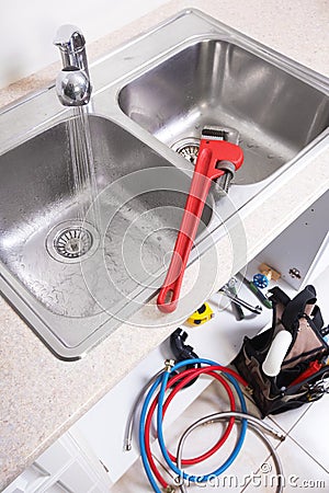 Kitchen Water tap and sink. Stock Photo