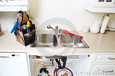 Kitchen Water tap and sink. Stock Photo