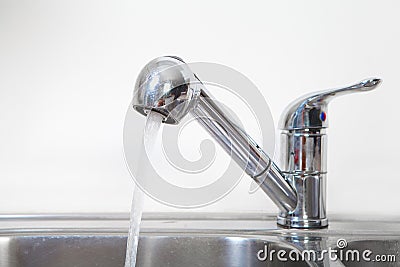 Kitchen Water tap and sink. Stock Photo