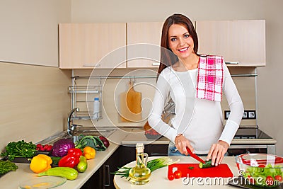 Kitchen woman making salad Stock Photo