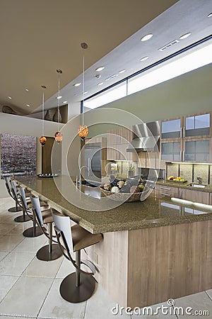 Kitchen Worktop And Barstools At Home Stock Photo