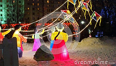 Kite flying children at the Lantern Garden of the Jinju Namgang Yudeung Festival Editorial Stock Photo