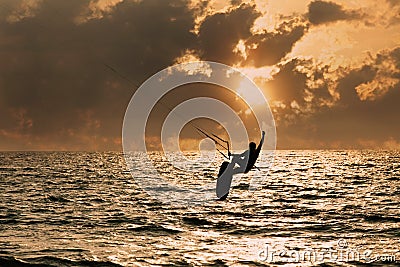 Kite surfer jumping from the water Stock Photo