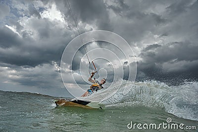 Kite surfer riding a kiteboard Stock Photo