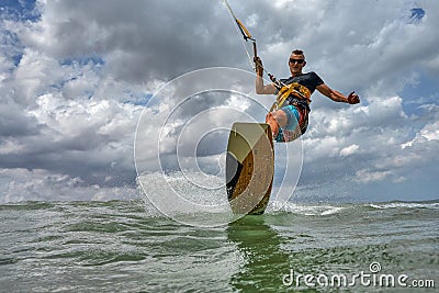 Kite surfer riding a kiteboard Stock Photo