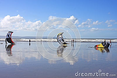 Kitesurfers on a beach Stock Photo