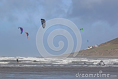 Kitesurfers riding waves Editorial Stock Photo
