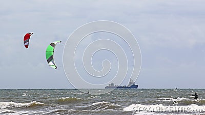 Kitesurfers on the sea Stock Photo