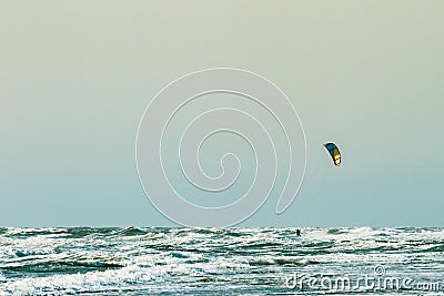 Kitesurfing at the seaside with big waves Stock Photo