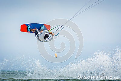 Kiteboarder kitesurfer athlete jumping, kitesurfing kiteboarding jump Stock Photo