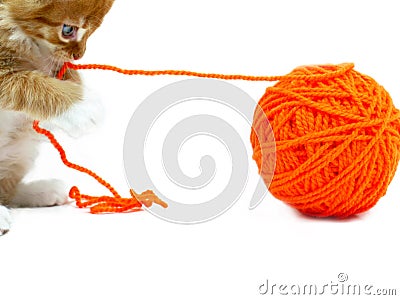 Kitten playing with ball of wool Stock Photo