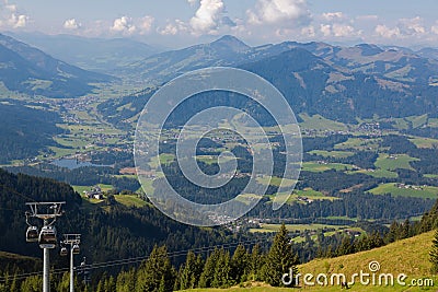 Kitzbuheler Hornbahn cable car with view of valley, mountains, S Editorial Stock Photo