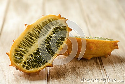 Kiwano or horned melon cut in halves Stock Photo