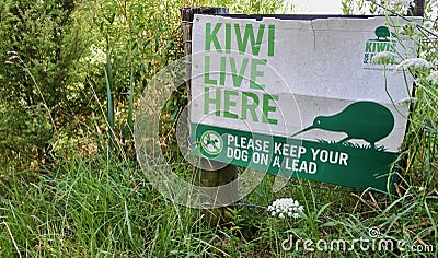 Kiwi live here sign in public park in Northland New Zealand Editorial Stock Photo