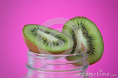 Kiwi with pink background Stock Photo