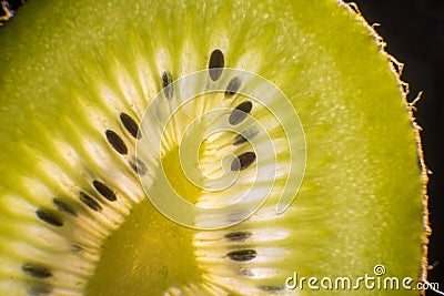 Kiwi - Seeds on Green Stock Photo