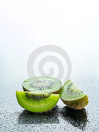 Kiwi water. Green kiwifruit isolated on white background. Organi Stock Photo