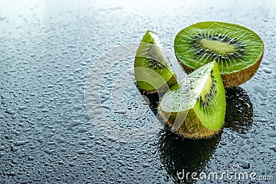 Kiwi water. Green kiwifruit isolated on white background. Organi Stock Photo