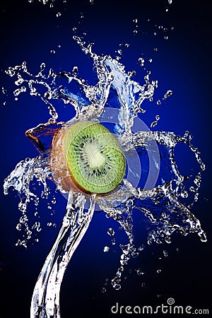 Kiwi in water splash Stock Photo