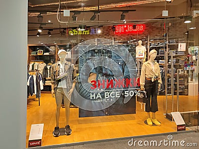 Kiyv, Ukraine - August 2, 2020: Shoppers walk past a Levi`s retail clothing store at Kiyv, Ukraine Editorial Stock Photo