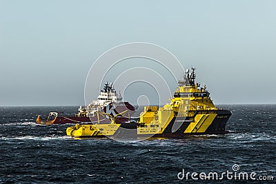 Anchor handling towing operations KL Sandefjord & Magne Viking Editorial Stock Photo