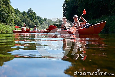 Canoeing by the river. Lithuania by the river Minija. Editorial Stock Photo