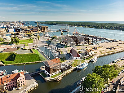 KLAIPEDA, LITHUANIA - AUGUST 9, 2020: Aerial view of beautiful yachts by the pier in the yacht club in Klaipeda, Lithuania. Editorial Stock Photo